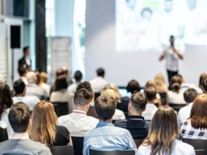 Group of people attending a speaking event